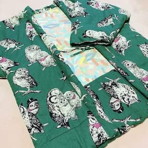 緑地にフクロウ柄が描かれた綿入れ半纏